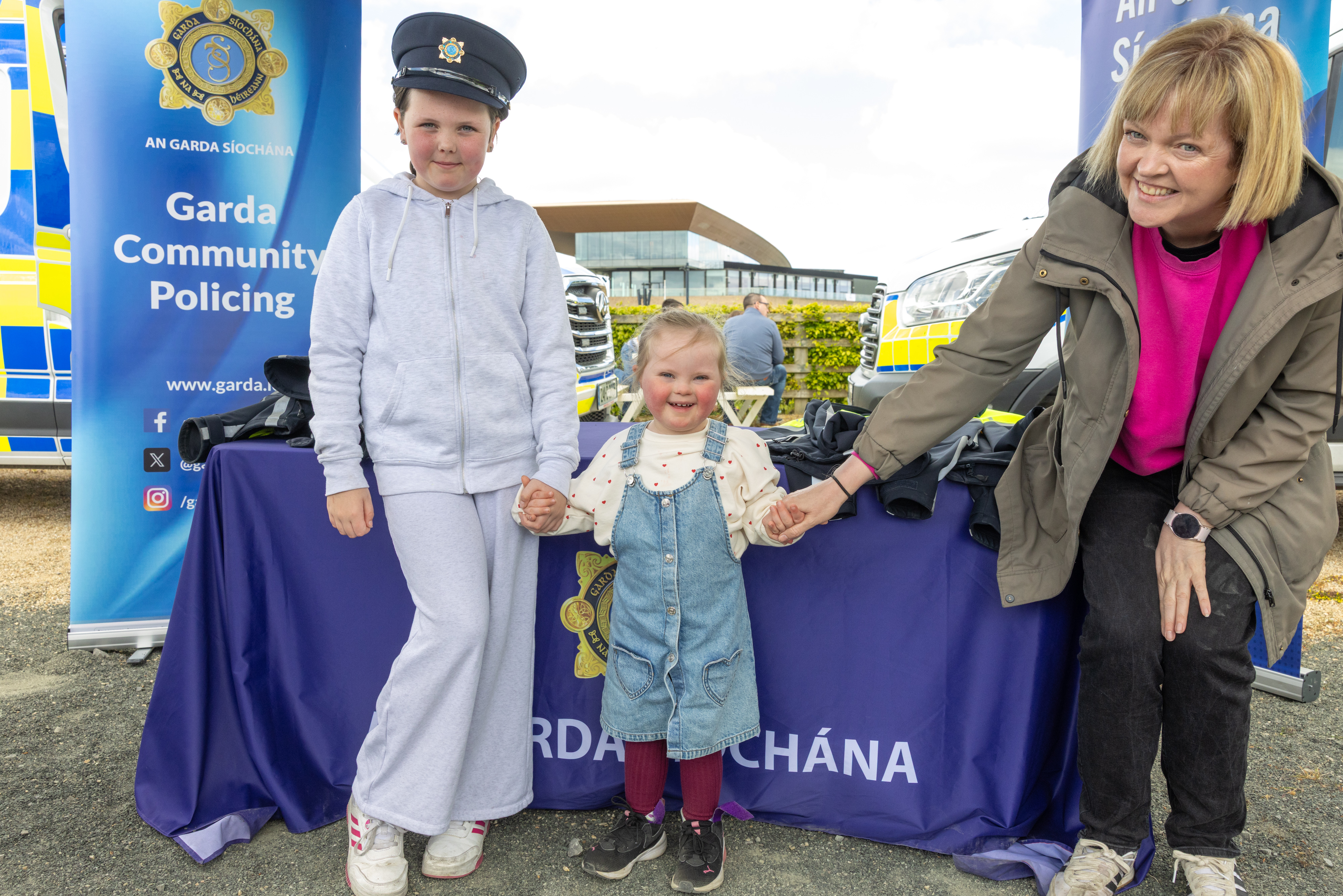 People at a Garda stall.